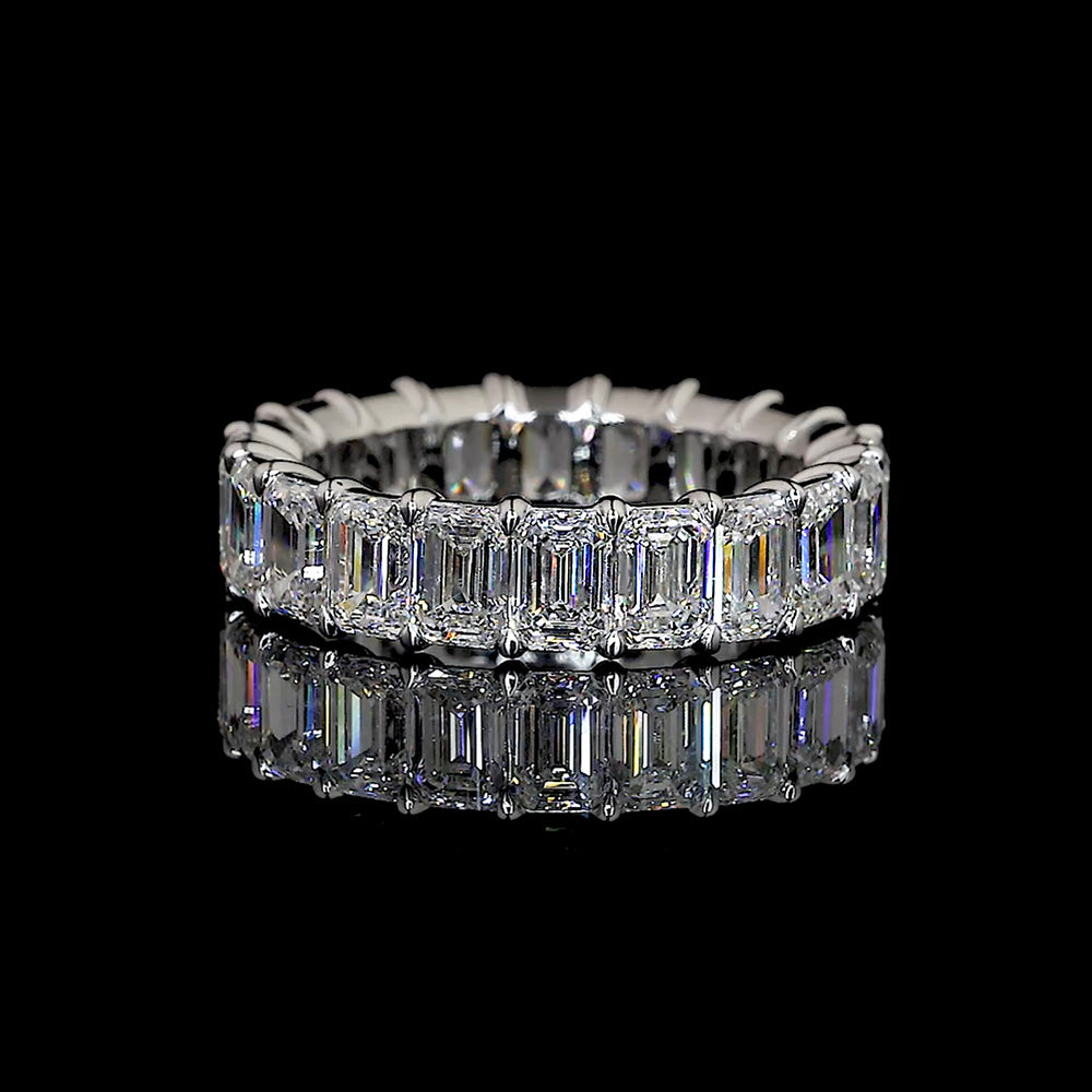 Emerald Cut Eternity Band in Platinum, or 14K Yellow/Rose/White Gold.
4.5cts total weight E/F VVS-VS (lab grown), G/H VVS-VS (natural)