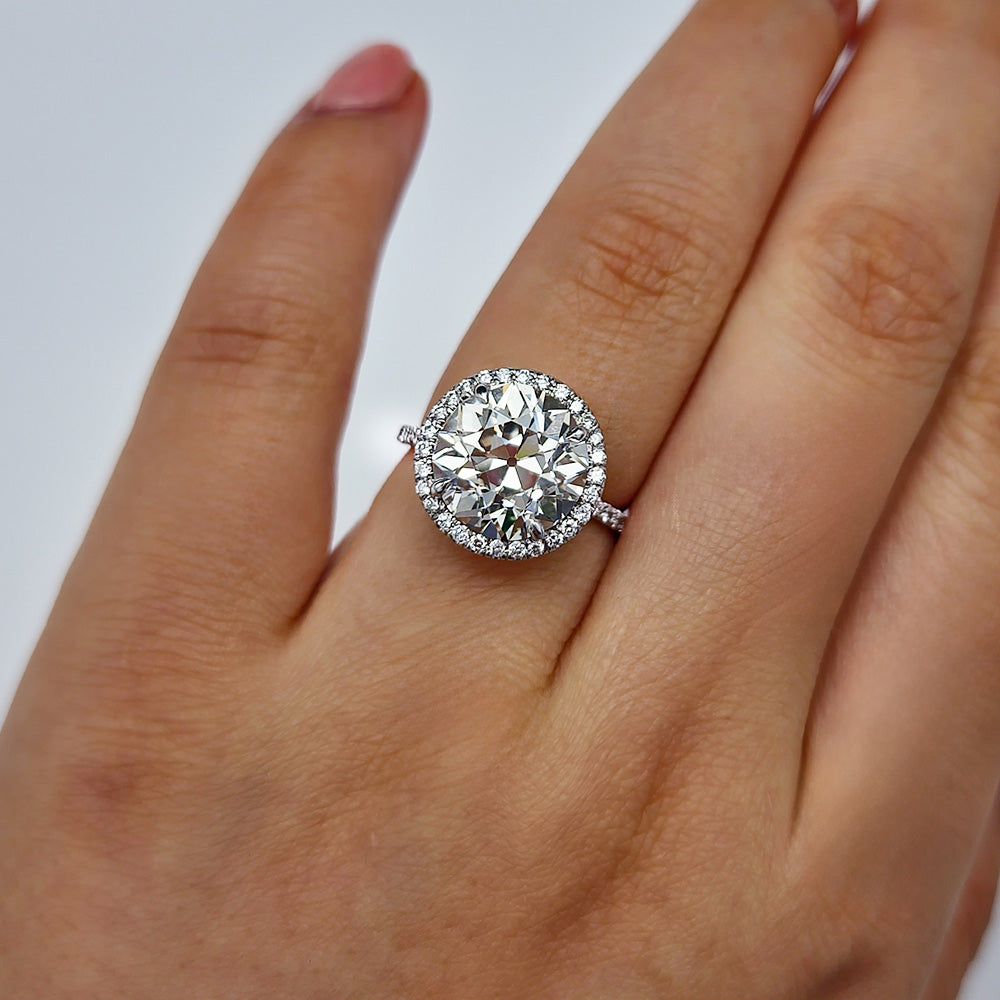 Old European Cut Diamond Engagement Ring on wedding finger