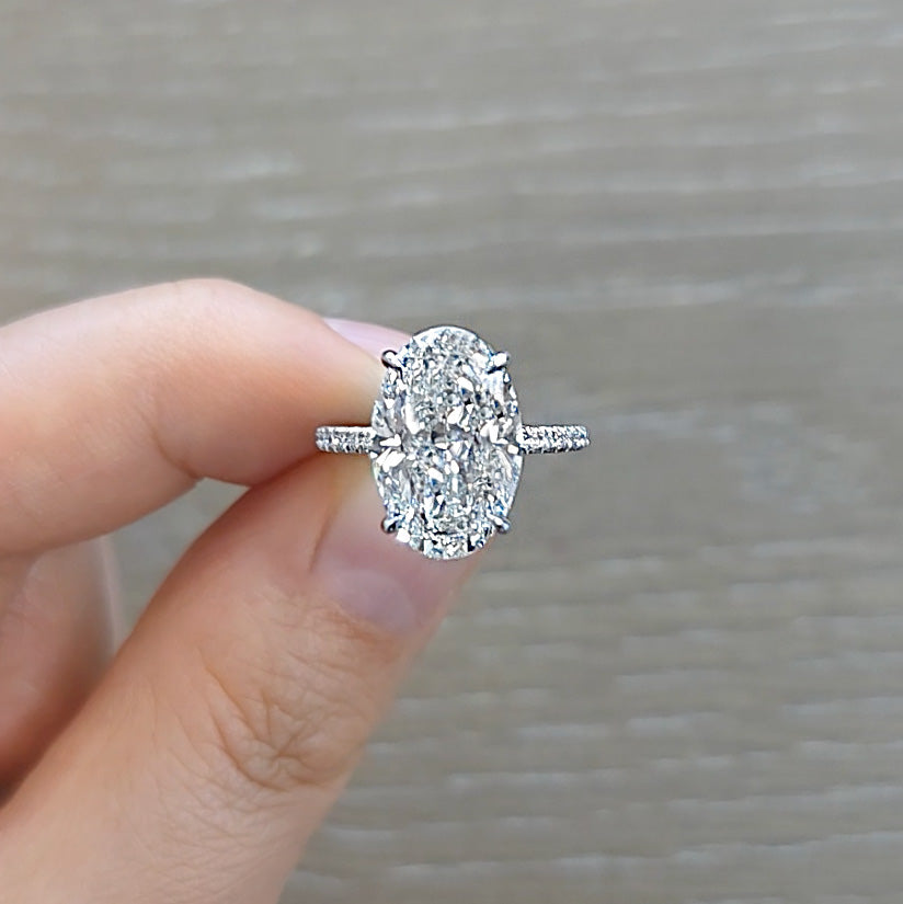 Oval Cut Diamond Ring on a Thin Pave Setting