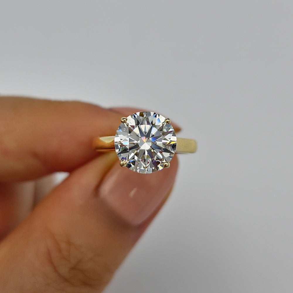 Round Brilliant Cut Diamond on Thick Yellow Gold Solitaire Cathedral Setting