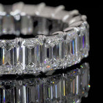 Emerald Cut Eternity Band in Platinum, or 14K Yellow/Rose/White Gold.
4.5cts total weight E/F VVS-VS (lab grown), G/H VVS-VS (natural)