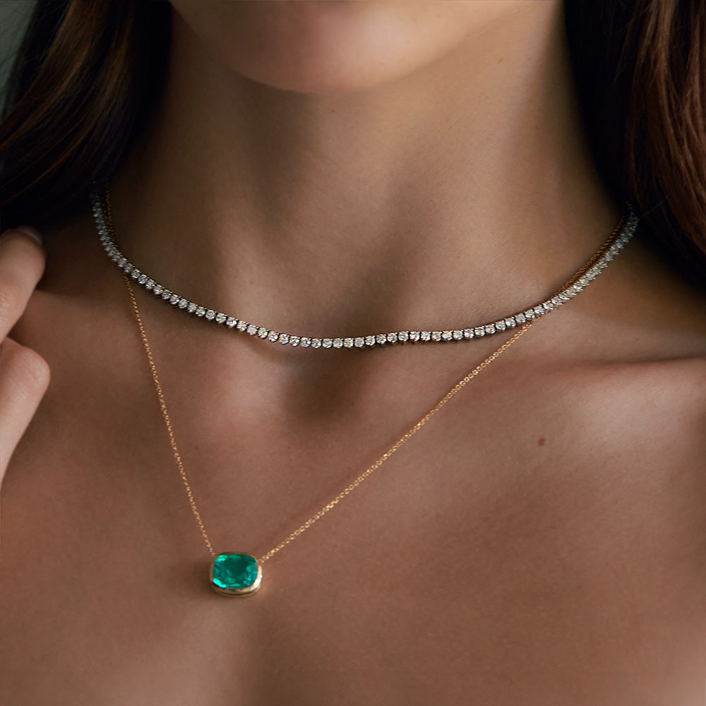 Diamond Tennis Necklace and emerald necklace